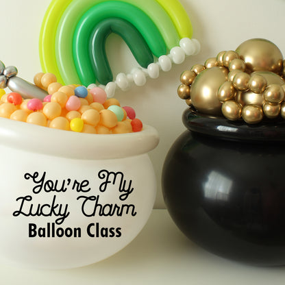 Balloon decor featuring a lucky monochrome rainbow, a balloon cereal bowl with spoon, and a gold-filled pot of gold—projects taught in the You’re My Lucky Charm Balloon Class by Lilly Jimenez. Perfect for St. Patrick’s Day photoshoots and festive event styling.