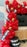 Red movie night balloon garland with film strip accents, gold star balloons, and stacked oversized film reel props for cinema party decor, Hollywood themed birthdays, award show events, theater parties, and watch party displays.
