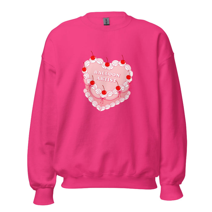 Hot Pink Sweater featuring a vintage-inspired heart cake design with cherries, white piping details, and the text "Balloon Artist" in the center.