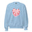 light blue sweater featuring a vintage-inspired heart cake design with cherries, white piping details, and the text "Balloon Artist" in the center.