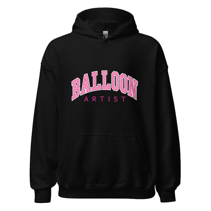 Black hoodie with "Balloon Artist" printed in bold pink lettering, featuring an arched design for the word "Balloon" and smaller text below for "Artist."