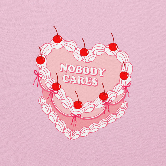 design featuring a vintage-inspired heart cake design with cherries, white piping details, and the text "Nobody Cares" in the center.