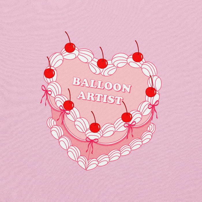 vintage-inspired heart cake design with cherries, white piping details, and the text "Balloon Artist" in the center.