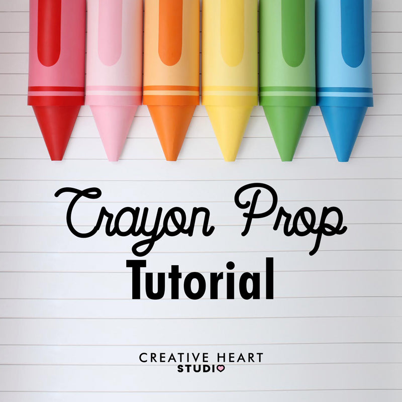 Colorful oversized balloon crayons in rainbow shades displayed on a lined paper background. This image represents the Crayon Prop Tutorial by Lilly Jimenez of Creative Heart Studio, where you’ll learn to create playful crayon decorations using balloons and templates—perfect for back-to-school events, classrooms, or colorful birthday party decor.