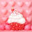 Red and white Cupcake Balloon Mosaic with balloon sprinkles and a balloon cherry on top. Back wall has pink heart balloons.