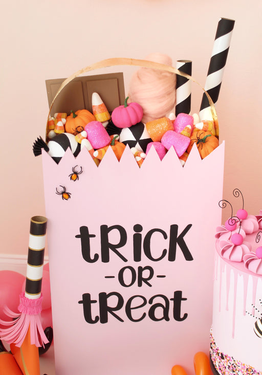 DIY Oversized Trick or Treat bag with diy candy decorations. Designed by The Creative Heart Studio