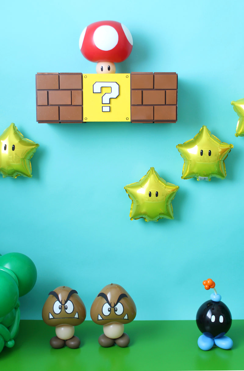 Luck Box with power up mushroom, made out of balloons, by Lilly Jimenez from the Creative Heart Studio.